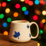 Handmade Ceramic Mug with Blue Leaf Design – 11oz